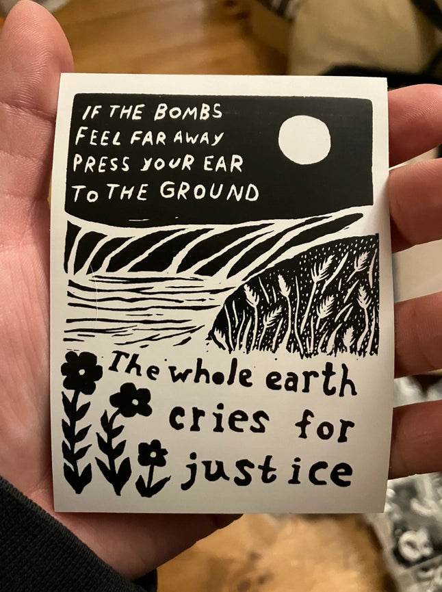 Lane Lloyd CoyoteSnout Vinyl Sticker - If The Bombs Feel Far Away, Press Your Ear To The Ground. The Whole Earth Cries For Justice.