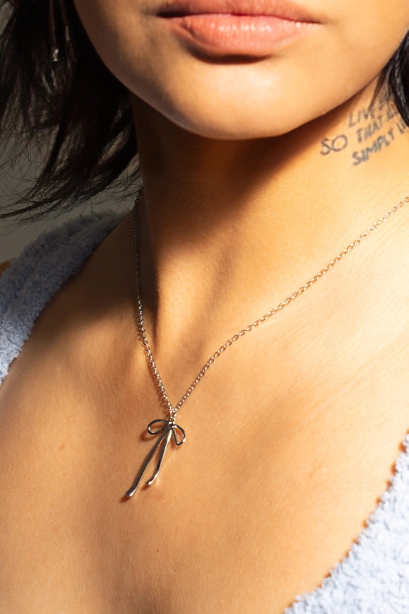 Peter + June Bad to the Bow Silver Necklace
